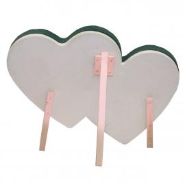 Double heart on polystyrene on the wooden stand