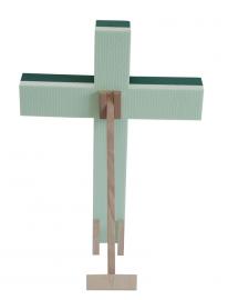 Cross on polystyrene on the wooden stand